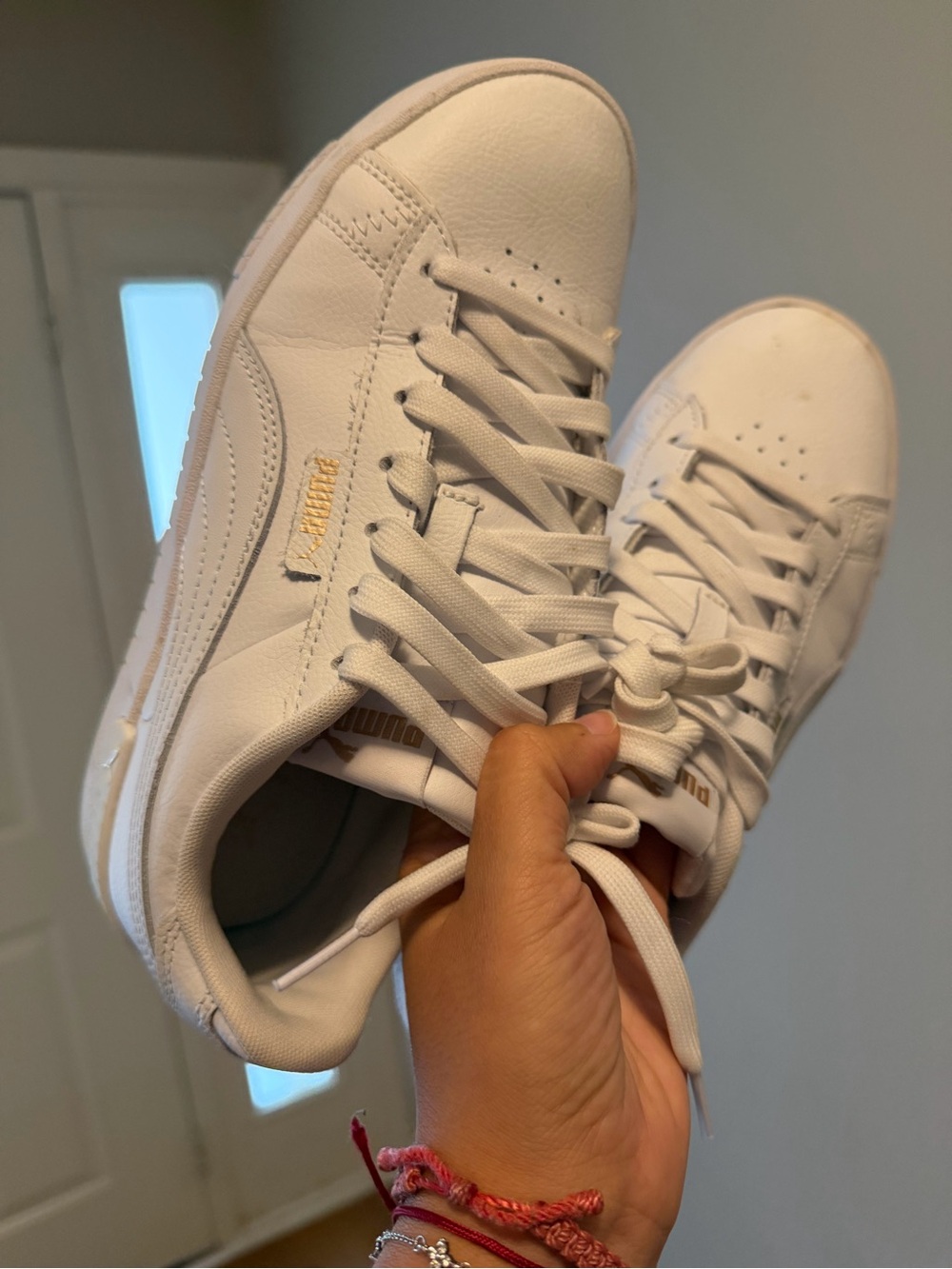 Puma women White Sneakers with Gold Logo Accent